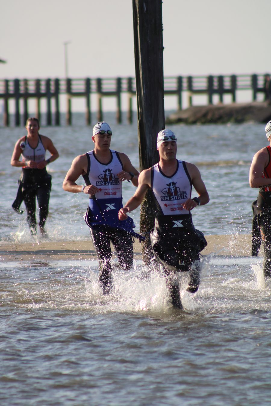 Trevon and Liam exiting the ocean at CCNC Nationals